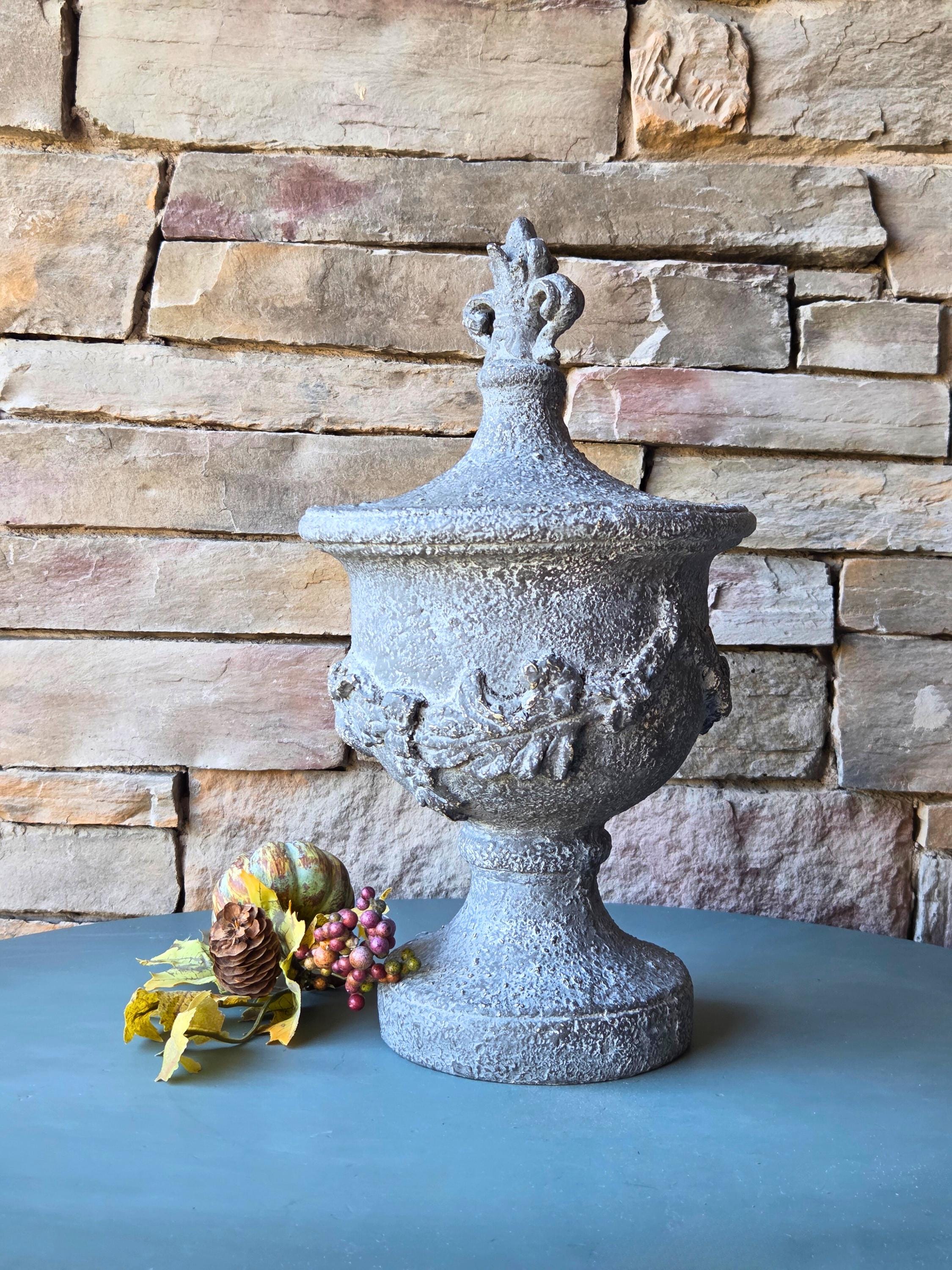 Decorative Resin Urn with Cherub Relief  16.5" Tall Classical Accent with Fleur-de-Lis Finial