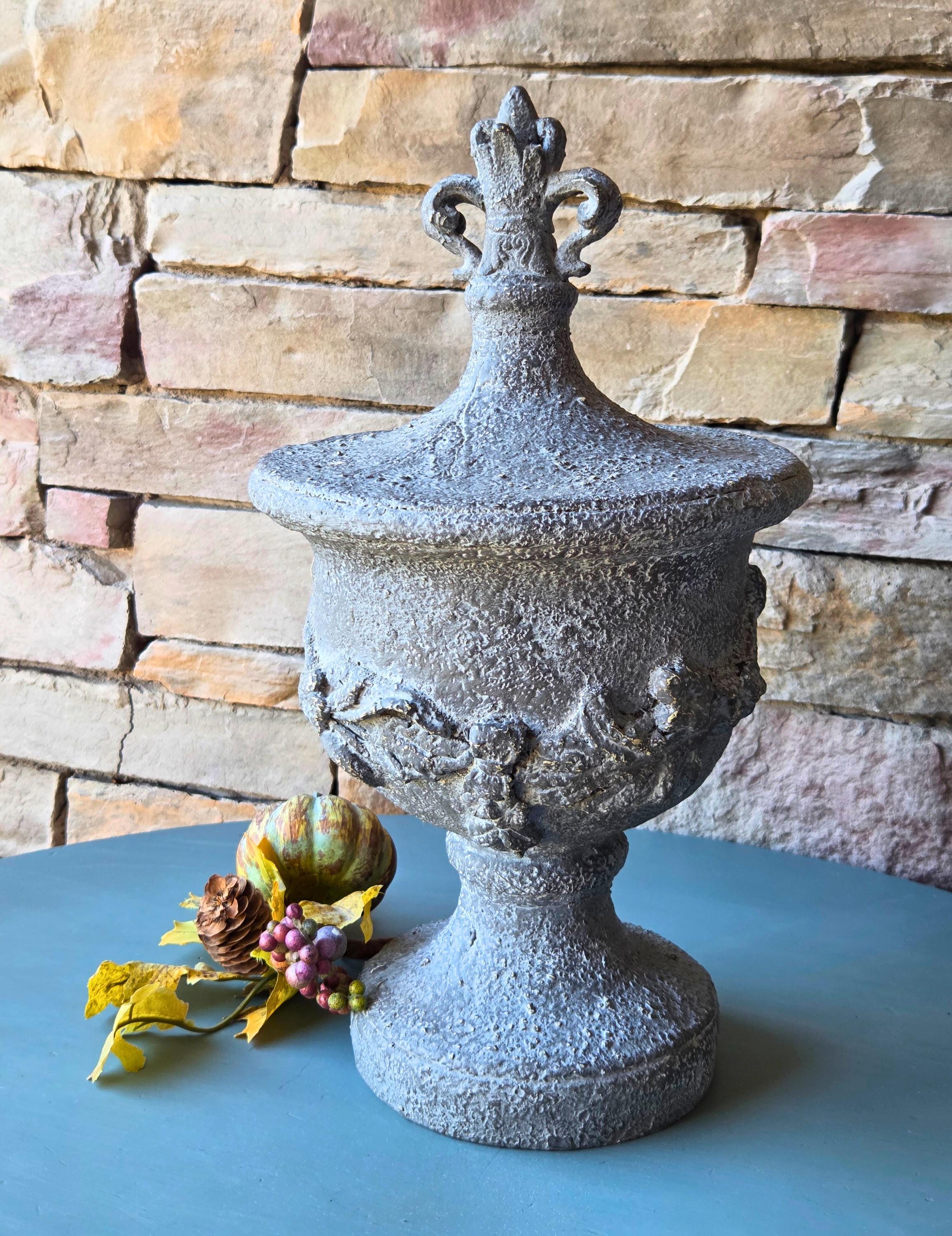 Decorative Resin Urn with Cherub Relief  16.5" Tall Classical Accent with Fleur-de-Lis Finial
